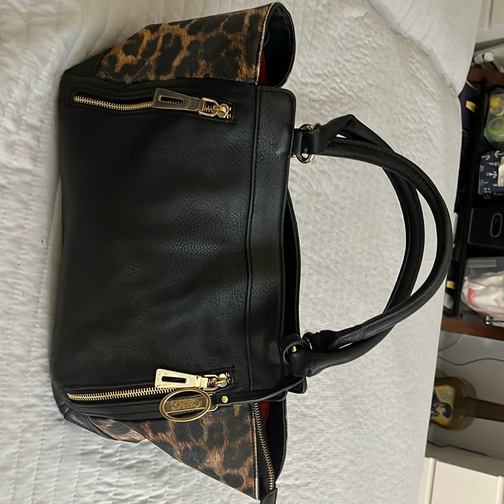 Carlos Santana Purse,Black Satchel with Leopeard print on side  of bag.